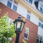 Photo of Providence House grounds where you can Schedule a Tour at Providence House, We have old styled lampposts and brickwork, the perfect recipe for an Active Senior Community